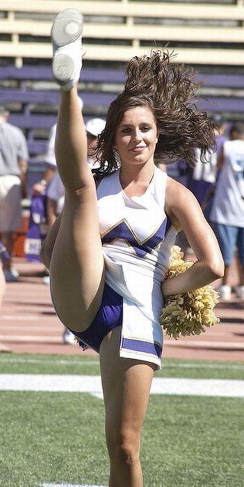 Cheer leader kicks high shows pussy  photo