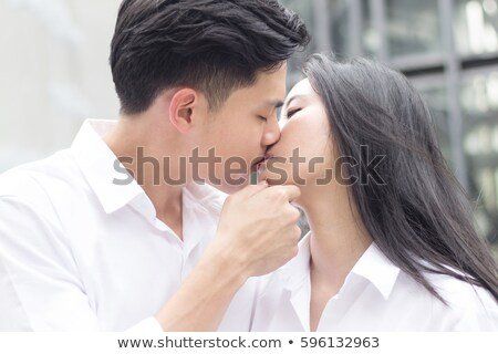 Asians deep kissing