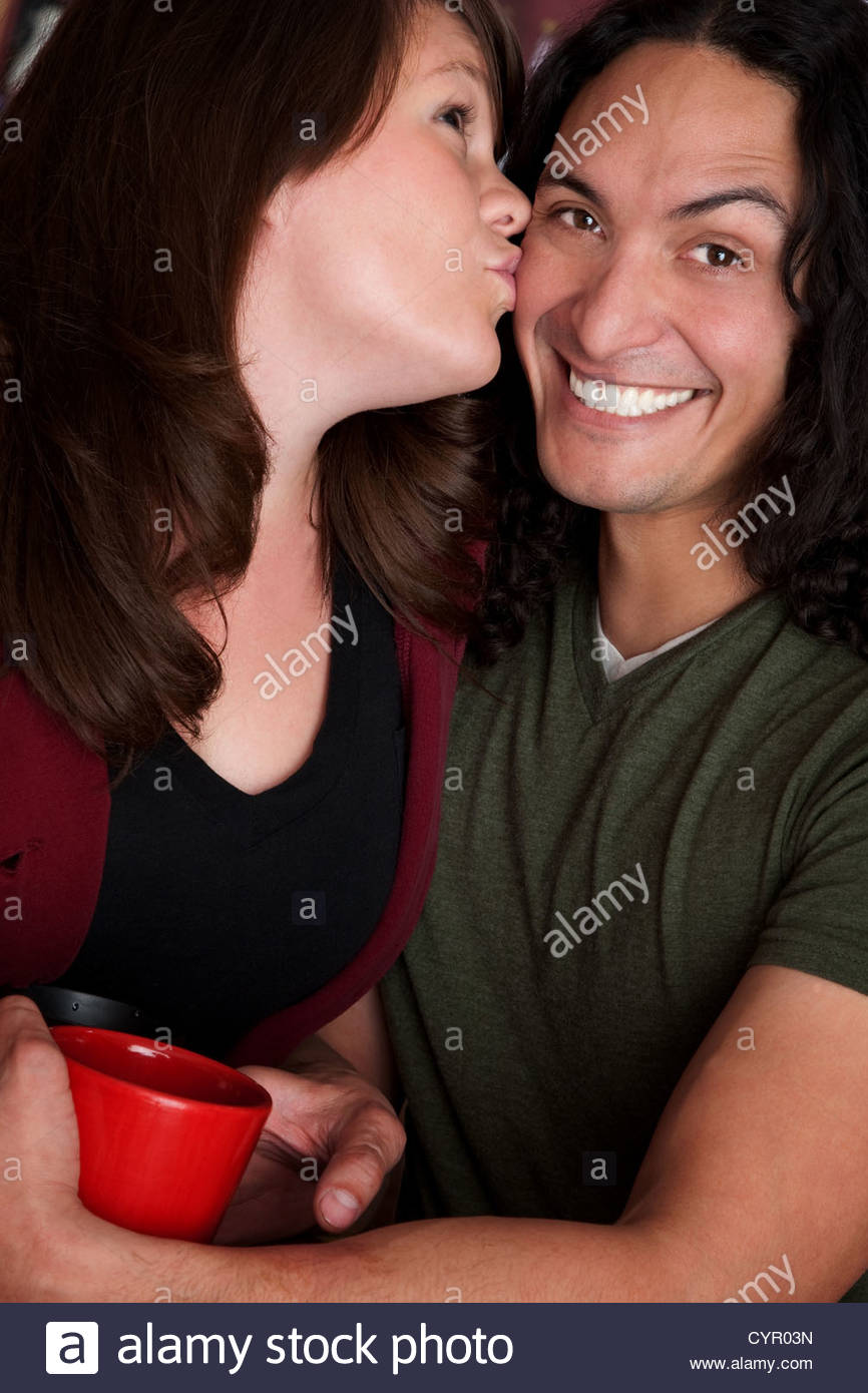 Girl interracial kissing  image photo