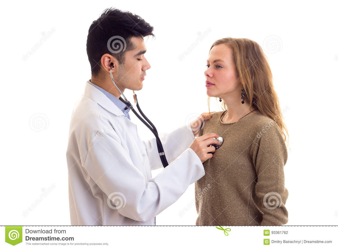 Listening to adult female heart beat with stethoscope